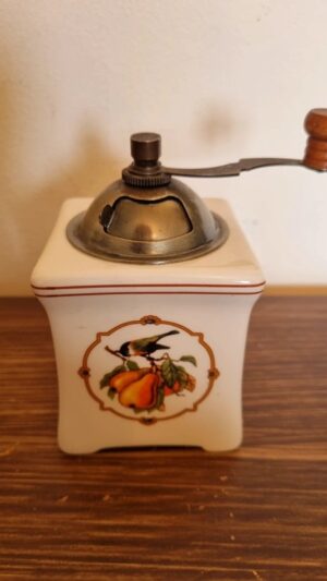 Petit moulin à poivre vintage en porcelaine
