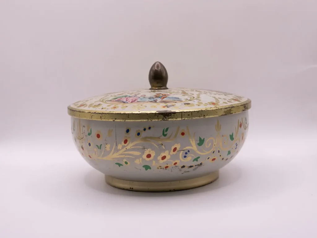 Boîte en métal ronde vintage Superchocolat Jacques dorée blanche