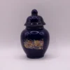 Pot à couvercle bleu décoratif avec motifs paon et fleurs