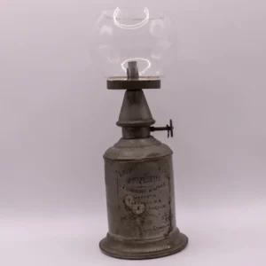 Ancienne lampe à essence L'Avenir modèle Charles Pigeon patinée