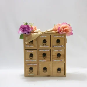 Organisateur vintage en bois avec 9 tiroirs de mercerie rose